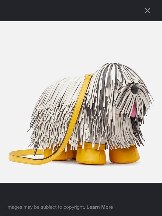 kate spade Handbags - Authentic Kate Spade Fringe Dog Crossbody Bag in White and Yellow